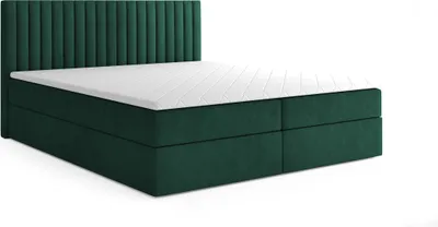 A dark green upholstered box spring bed with a white mattress and topper, shown against a white background.