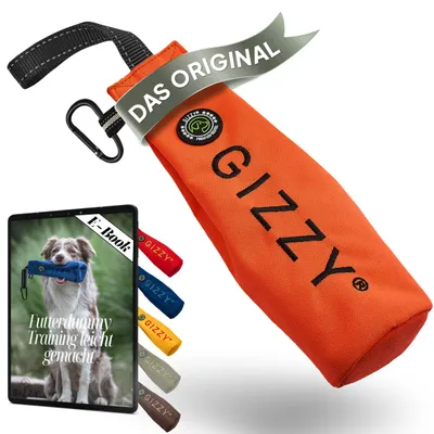 A dog training dummy and an e-book cover are shown, with multiple dummy colors in the background.