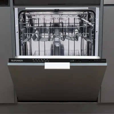 An open dishwasher with its interior racks visible, set against a neutral gray background.
