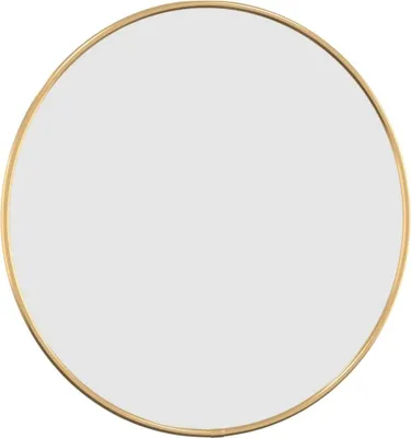 A round mirror with a gold frame.