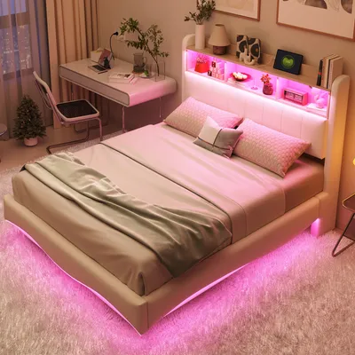 A modern bedroom with a bed, desk, and chair, illuminated by pink LED lights.