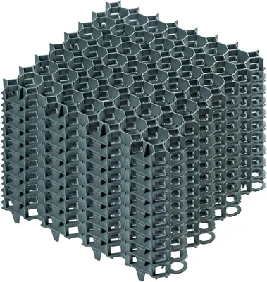 A stack of gray plastic grid modules, likely for landscaping or ground stabilization.