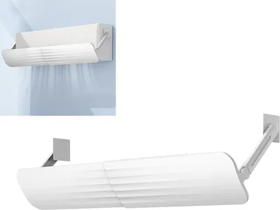 A white adjustable air conditioner wind deflector is shown mounted on a wall.