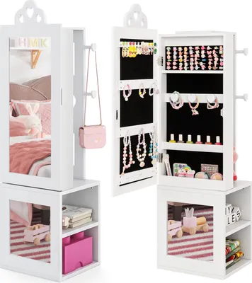 A white jewelry cabinet with a mirror, open to reveal storage for jewelry and accessories, with a shelf unit below containing toys and books.