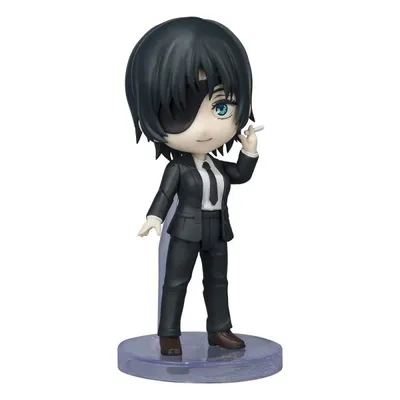A small figurine of an anime character in a suit, holding a cigarette.