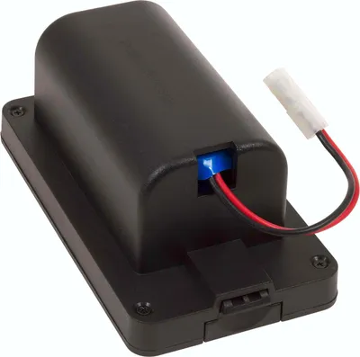 A black battery pack with red and black wires and a white connector.