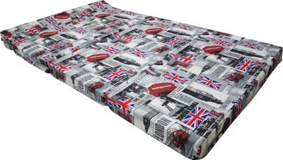 A mattress with a London-themed pattern.