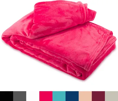 A folded pink fleece blanket is shown against a white background.