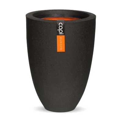 A black planter with an orange interior and a label on the side.
