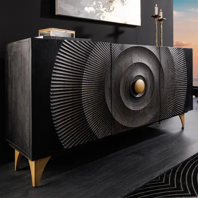 Produktbild von riess-ambiente Handgearbeitetes Sideboard GOLDEN SUNSET 140cm schwarz mit 3D Schnitzereien gold Mangoholz Metallbeine