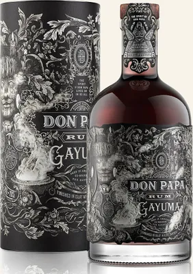 A bottle of Don Papa Gayuma rum and its cylindrical packaging are displayed against a white background.