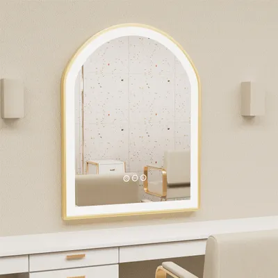 A well-lit vanity area with a large arched mirror with integrated LED lighting.