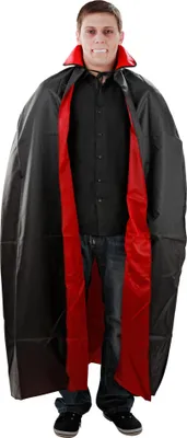 A man wearing a vampire costume, including a black cape with a red lining and a red collar.