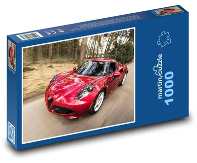 Obrázok produktu pre Puzzle 1000 Červené športové auto na ceste - martinpuzzle