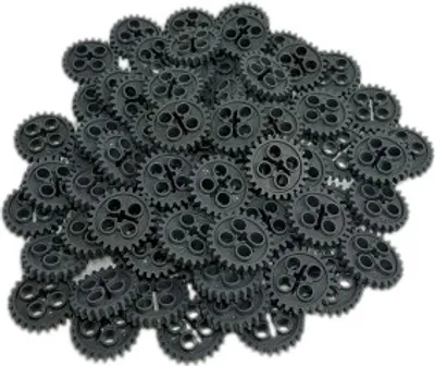 A pile of dark gray LEGO Technic gears.