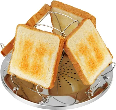 A toaster rack with four slices of toast on a white background.