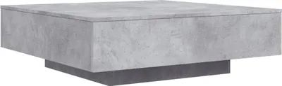 A square coffee table with a concrete-like finish and a dark base.