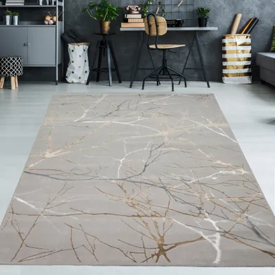 A modern living room or office space with a rug as the central focus.