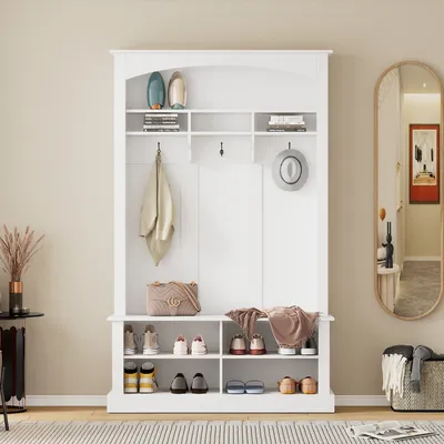 A white hall tree with shelves and hooks, displaying shoes, bags, and a hat.