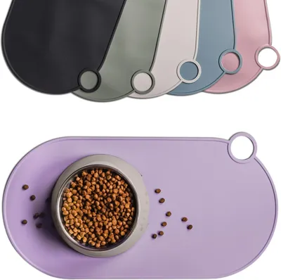 Imagen del producto de Alfombrilla para comida para gatos y perros pequeños, de silicona, 49 x 25 cm, antideslizante