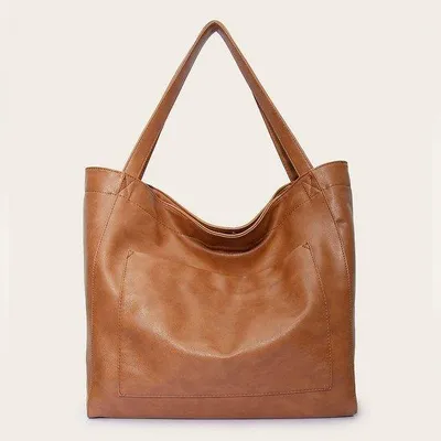 Immagine prodotto di Grande borsa a tracolla vintage in , con dettagli dorati, ideale per essere portata con sé.