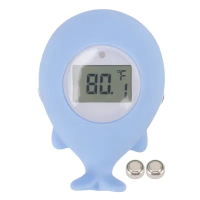 A light blue baby bath thermometer shaped like a whale, displaying a temperature of 80 degrees Fahrenheit.