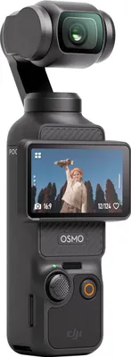 A black DJI Osmo Pocket 3 gimbal camera is shown from the back, with its screen displaying a person holding a skateboard.