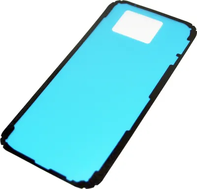 A close-up, angled view of a blue adhesive sticker with a white rectangular cutout, set against a white background.