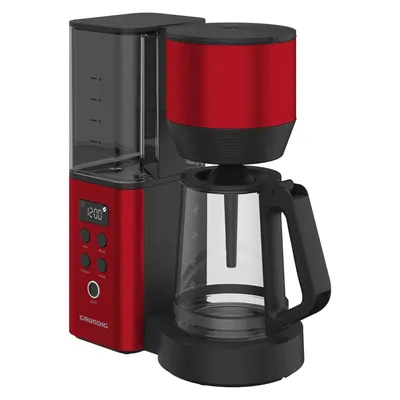 A red and black filter coffee maker with a glass carafe and a digital display.