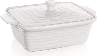 A white ceramic rectangular casserole dish with a lid, shown from a slightly elevated side angle on a white background.