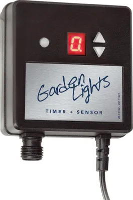 A close-up studio shot of a Garden Lights Timer/Sensor device.