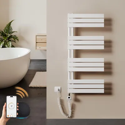 A modern bathroom with a freestanding bathtub, a plant, and a white electric towel warmer.