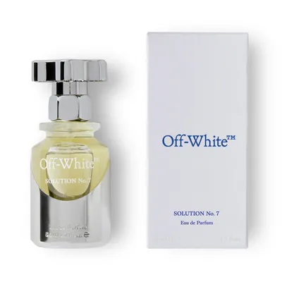 A perfume bottle and its box are displayed against a white background.