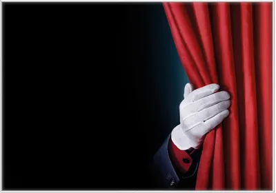 Produktbild von Wallario Wandbild Vorhang auf für die Show  Hand hinterm roten Vorhang, Größe: 70,30 x 100,30 cm, Poster mit weißem Kunststoffrahmen