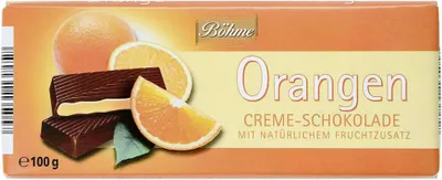 A chocolate bar package with images of oranges and chocolate.