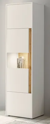 A tall, narrow cabinet with a white exterior and a wooden accent panel. It has several doors and a lit display niche.
