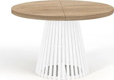 A round dining table with a wooden top and a white, slatted base.