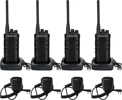 Four black walkie-talkies with charging docks and four shoulder microphones are arranged in two rows on a white background.