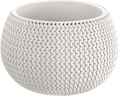 A white knitted-look plant pot on a white background.