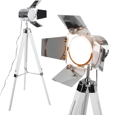 Two studio lights on white tripods against a white background.