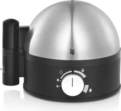 A close-up shot of a black and silver egg cooker.