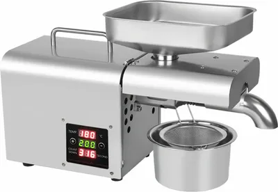A stainless steel electric oil press machine with a digital display and accessories.