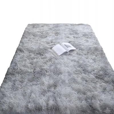 Immagine prodotto di Tappeto peluche grigio 100x150