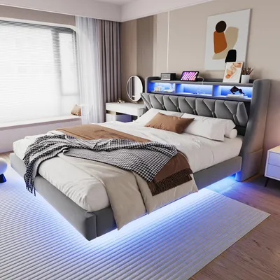 A modern bedroom with a bed, dresser, and window.