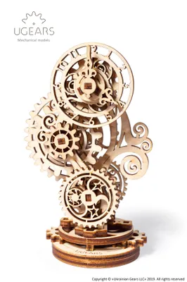 A 3D wooden mechanical puzzle of a steampunk clock is displayed against a white background.