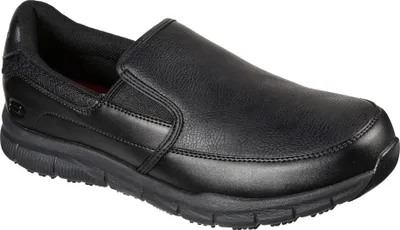 A black slip-on shoe is shown from a side angle against a white background.
