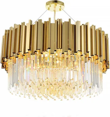 A close-up studio shot of a gold and crystal chandelier.