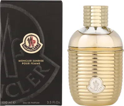 A product shot of Moncler Sunrise Pour Femme perfume and its packaging.