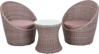 A set of two wicker chairs and a small round table with a glass top, presented on a white background.
