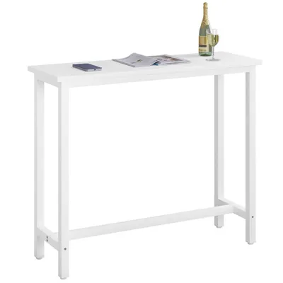 A white bar table with a bottle of champagne and a glass on top.